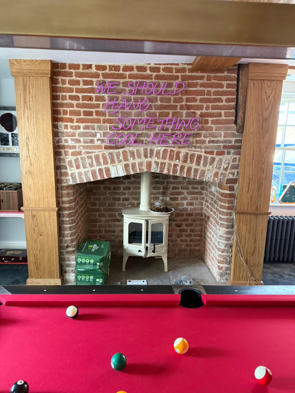 Twin-door stove with oak beam